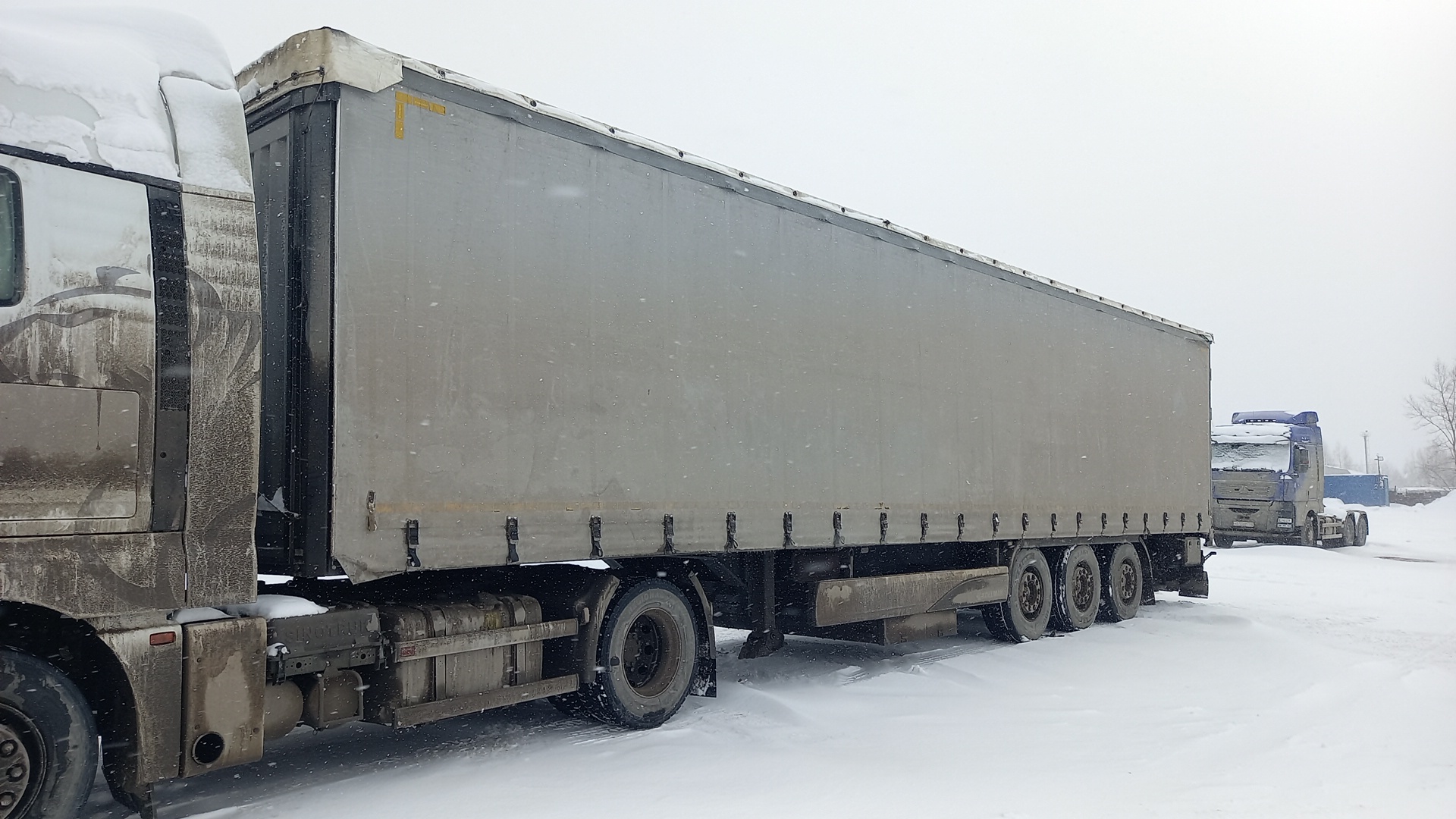 Полуприцеп шторно-бортовой Koluman S