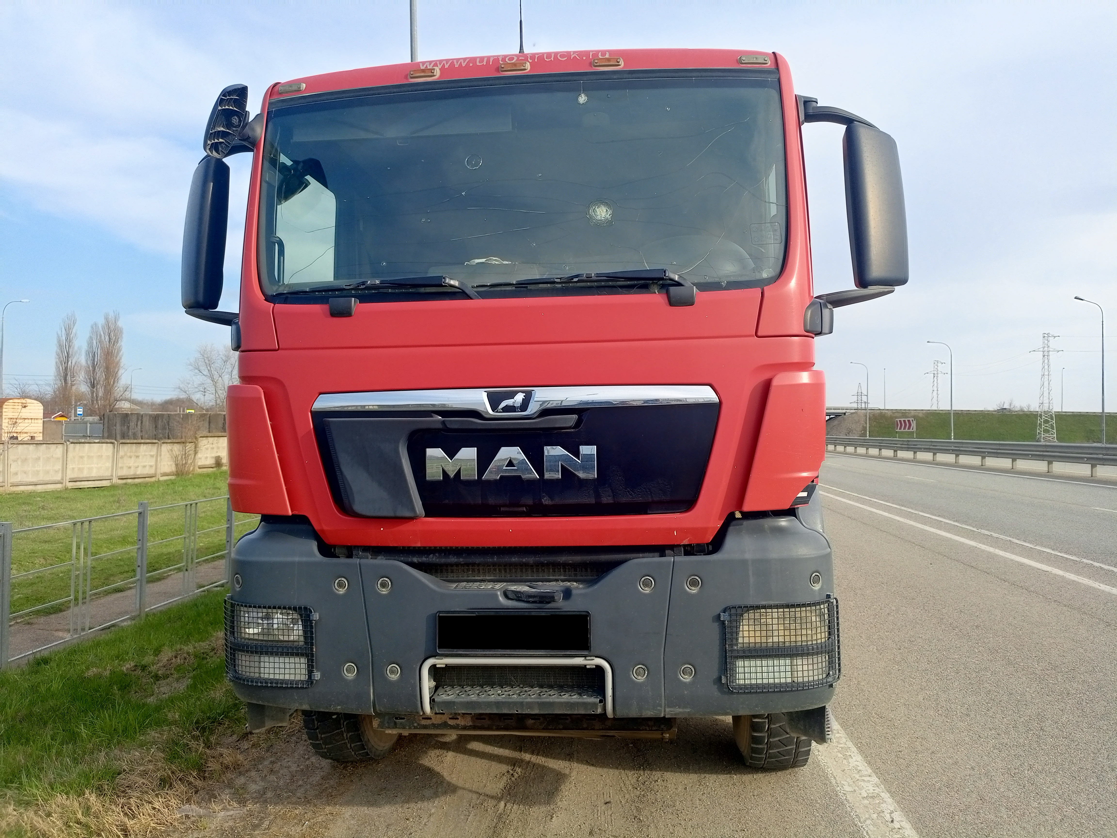Автосамосвал БЦМ-59.5 на шасси Man TGS 41.440 8x4 BB-WW