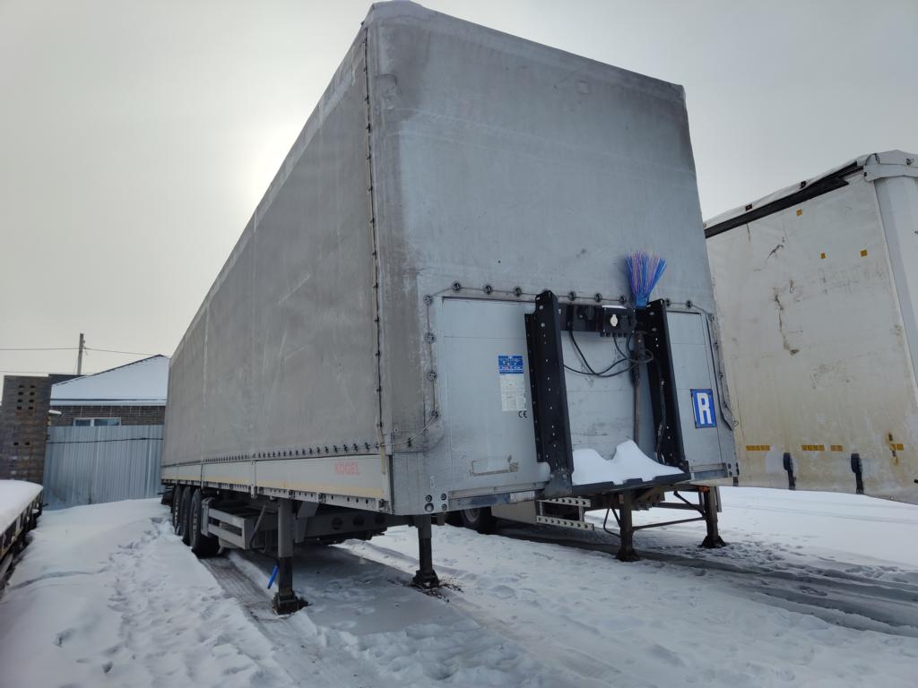 Полуприцеп с бортовой платформой Kogel S24