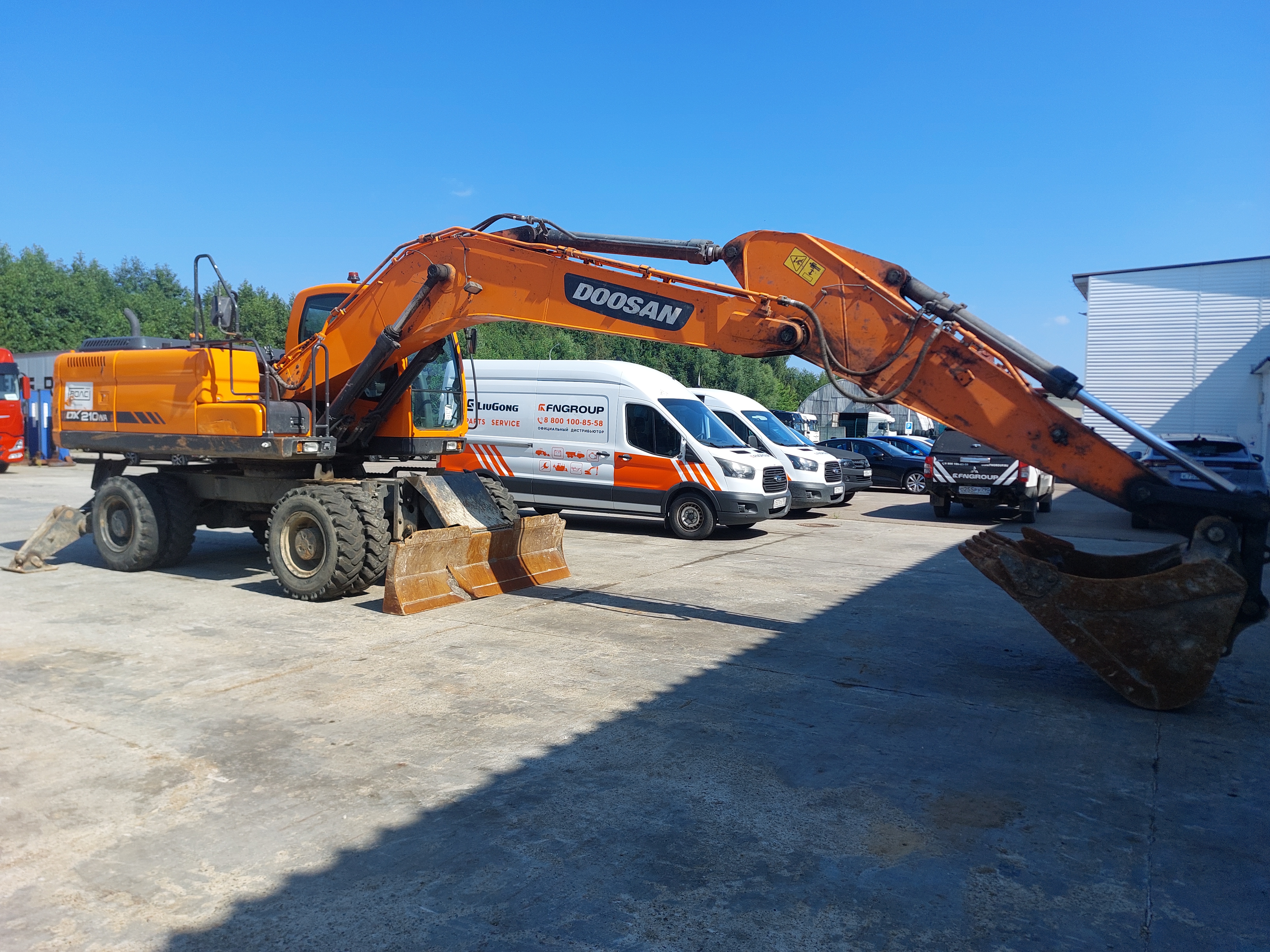 Экскаватор колесный Doosan DX210WA