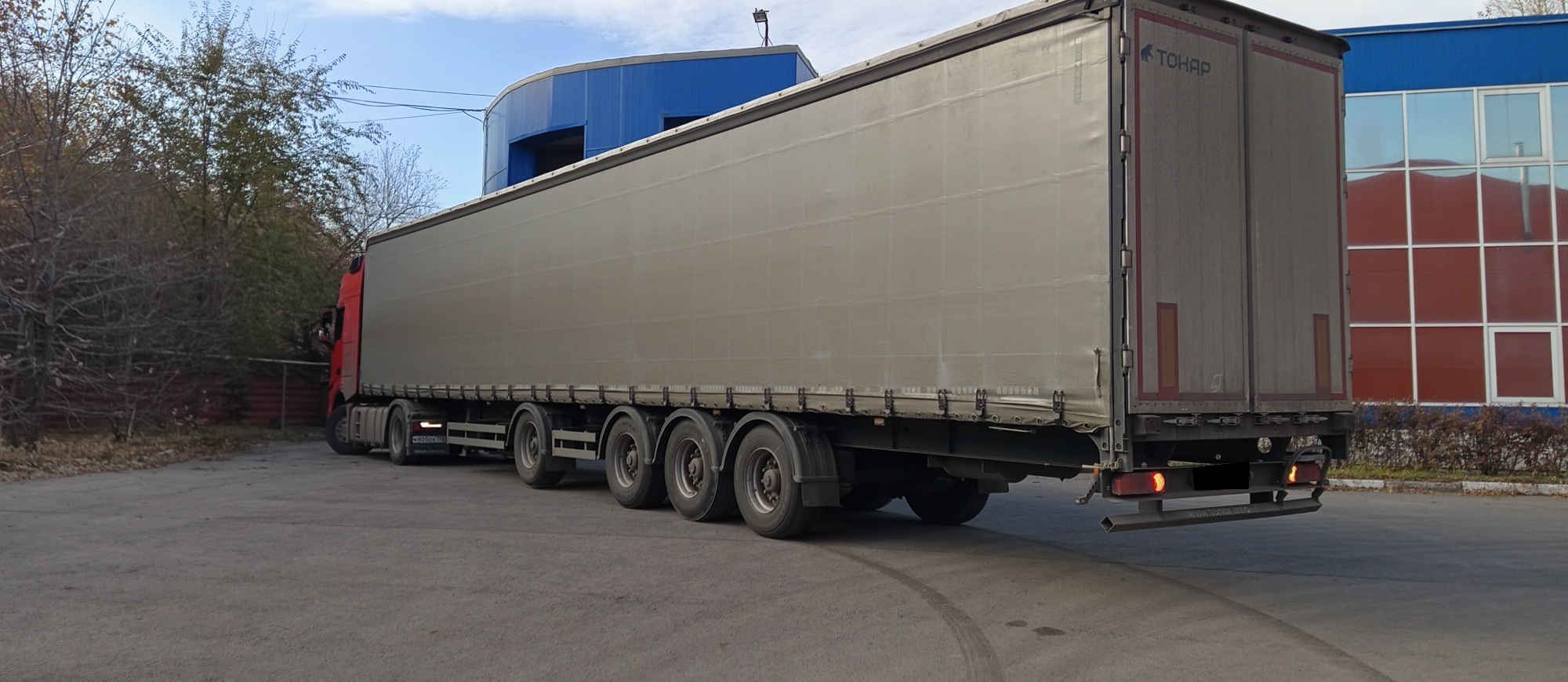 Полуприцеп шторно-бортовой тентованный ТОНАР 97882