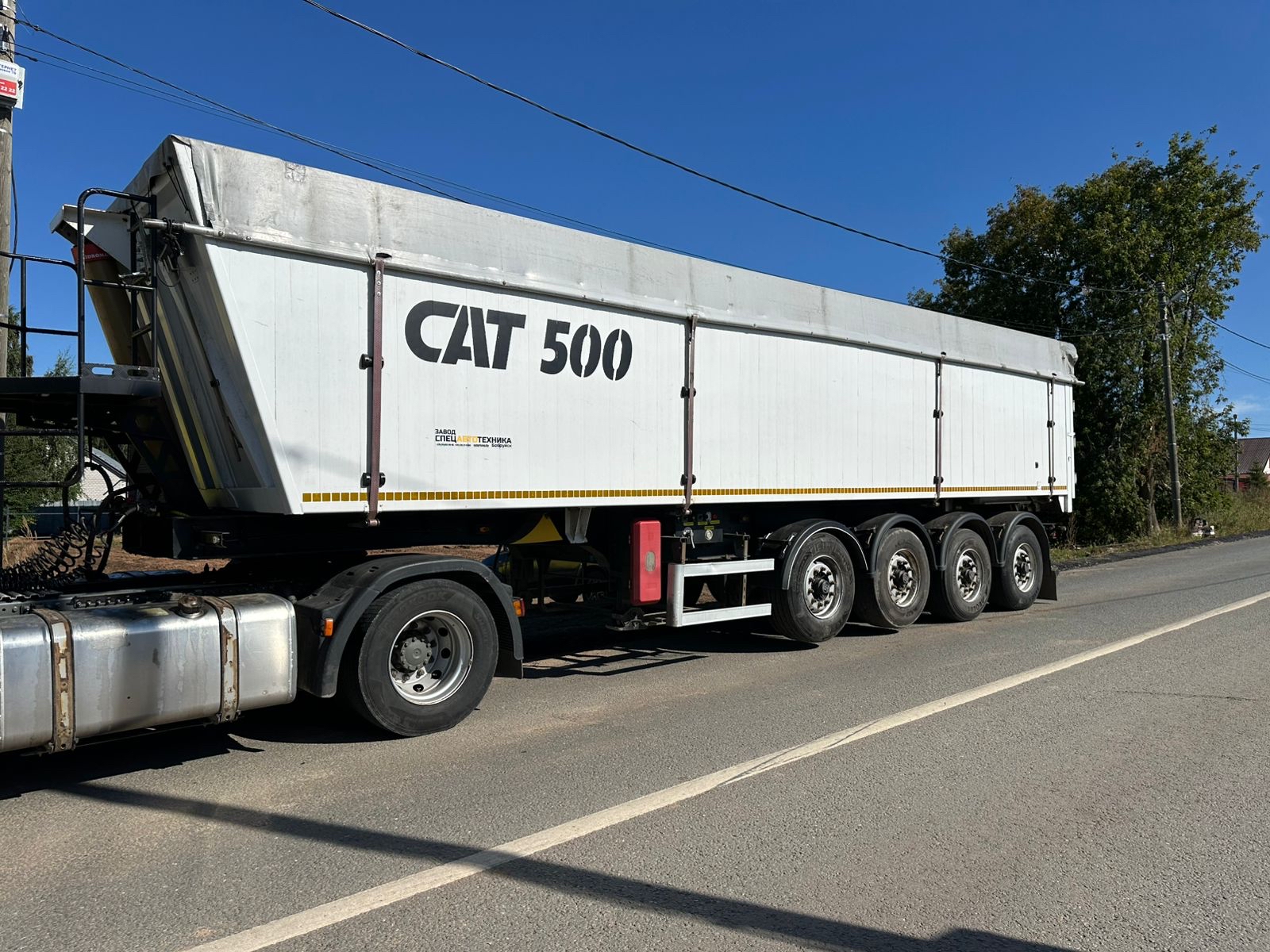 Полуприцеп-самосвал CAT